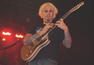 John 5 performs onstage