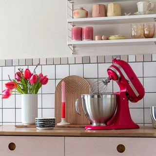 Colorful mood mixer with fresh flowers and rainbow design serving board