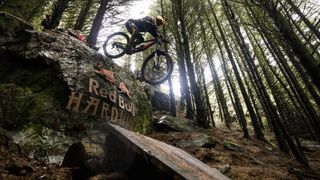 Louise Ferguson riding at RedBull Hardline in the Dyfi Valley, Wales on July 11th, 2023.