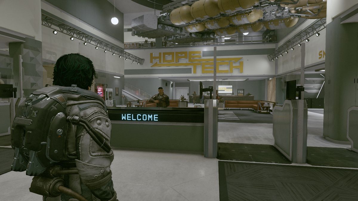 Starfield hopetown location - the player is standing in front of a welcome desk in the lobby of Hopetech