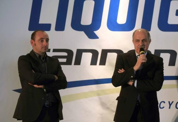 Italian coach Paolo Bettini alongside FCI president Renato Di Rocco.