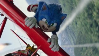 Sonic hanging from flying airplane in Sonic the Hedgehog 2