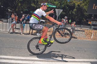 Peter Sagan celebrates winning stage four of the 2018 Tour Down Under with a wheelie