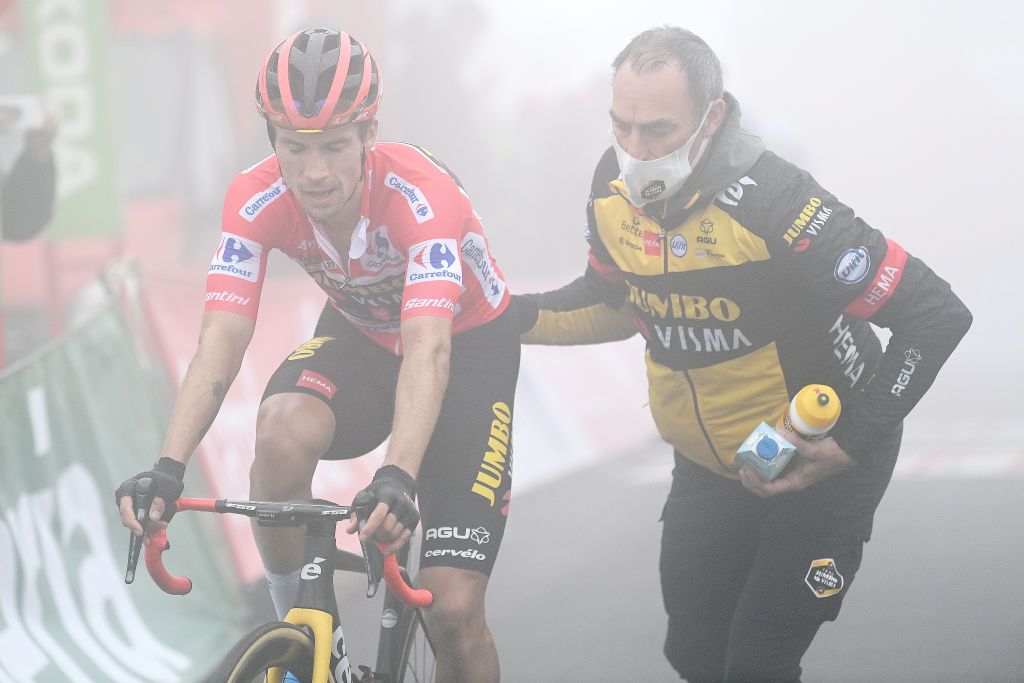 ALTU DEL GAMONITEIRU SPAIN SEPTEMBER 02 Primoz Roglic of Slovenia and Team Jumbo Visma red leader jersey reacts after crosses the finishing line during the 76th Tour of Spain 2021 Stage 18 a 1626km stage from Salas to Altu dEl Gamoniteiru 1770m lavuelta LaVuelta21 on September 02 2021 in Altu dEl Gamoniteiru Spain Photo by Stuart FranklinGetty Images
