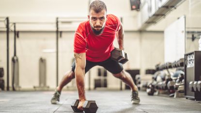 Man performing dumbbell row