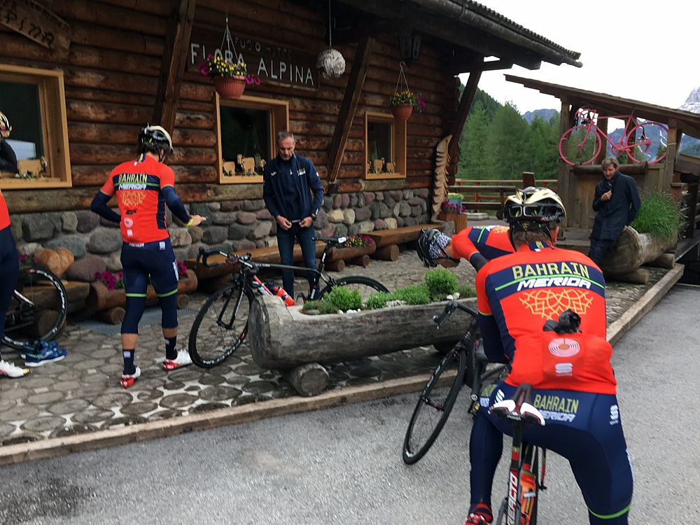 The riders prepare to roll out from the Flora Alpina mountain refuge