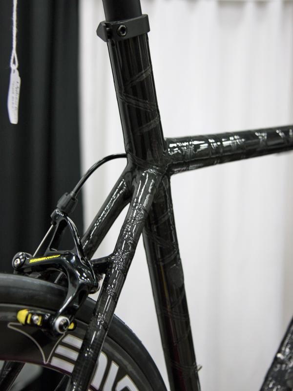 Matt Appleman says his exterior carbon fiber overlay is inspired by DNA's helical structure with the strand spacing adjusted depending on how much reinforcement he wants in a particular area.