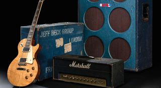 A Gibson Les Paul rests against an old blue speaker cabinet stencilled with "Jeff Beck Group London" in this promo shot for Christie's auction of the late guitar hero's gear collection.