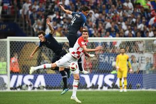 Manchester United France's defender Raphael Varane (TOP) and France's defender Benjamin Pavard (L) vie with Croatia's forward Mario Mandzukic during the Russia 2018 World Cup final football match between France and Croatia at the Luzhniki Stadium in Moscow on July 15, 2018. (Photo by FRANCK FIFE / AFP) / RESTRICTED TO EDITORIAL USE - NO MOBILE PUSH ALERTS/DOWNLOADS (Photo credit should read FRANCK FIFE/AFP via Getty Images)
