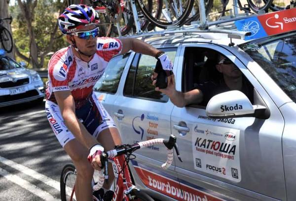 Joan Horrach of Katusha gets a pick-up from the team car.