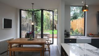 How to protect your home: open plan kitchen extension with stylish bi fold doors