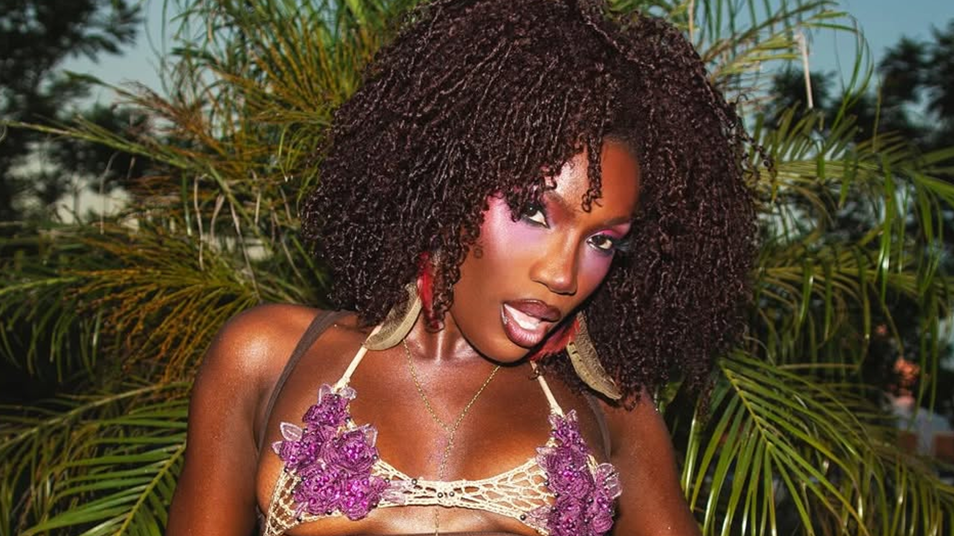 Doechii wore an itty-bitty mesh bralette to perform at Lollapalooza in Brazil 