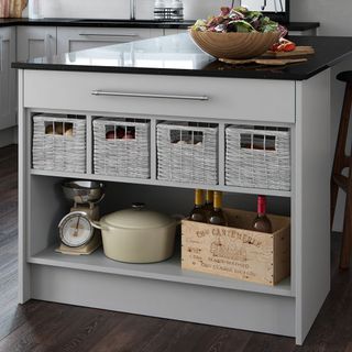 kitchen storage with end shelving and baskets