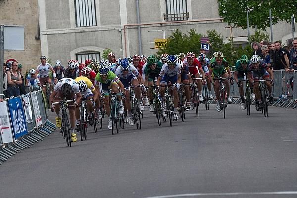 The peloton in full flight as they sprint to the finish line.