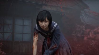 Hinako Shimizu limping towards a monster while a red fog engulfs a house behind her during the reveal trailer for Silent Hill f. 