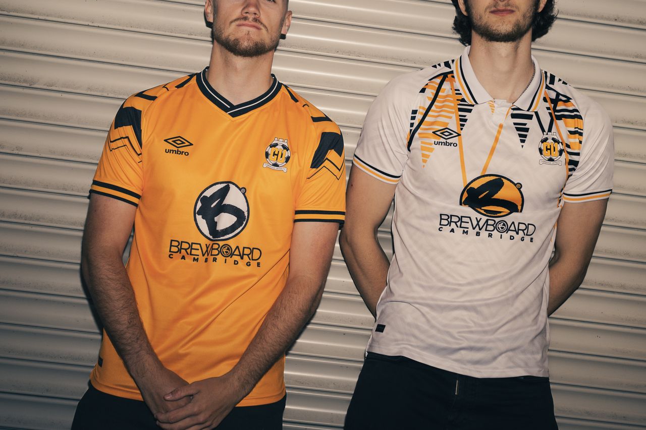 Cambridge United's home and away Umbro shirts from the 2023-24 season