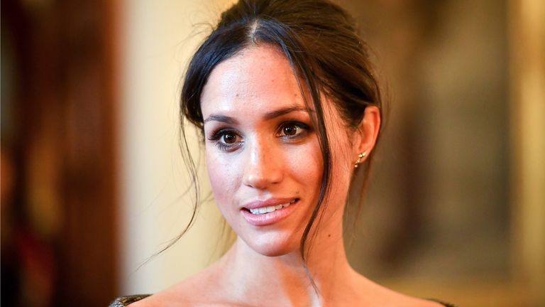 Meghan Markle chats with people inside the Drawing Room during a visit to Cardiff Castle on January 18, 2018 in Cardiff