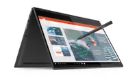 Lenovo Yoga C630 Chromebook shown in tent mode with stylus being used to draw on its screen