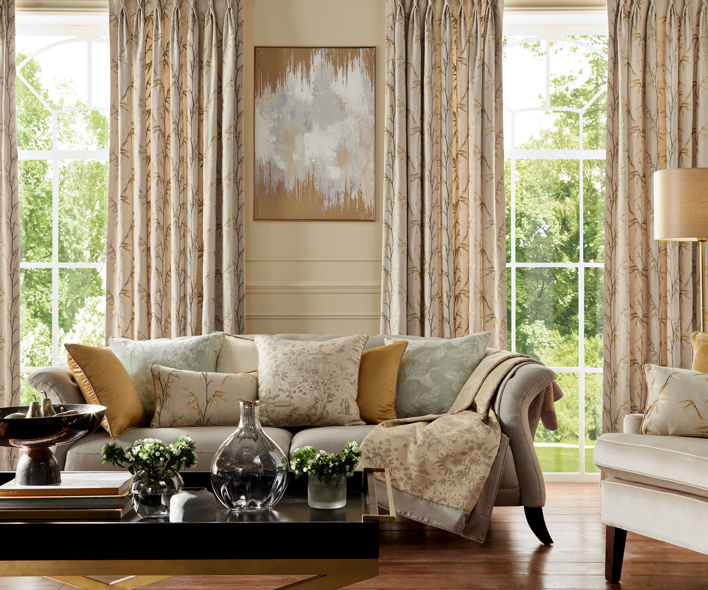 elegant Regency style living room with floor to ceiling windows and full length curtains