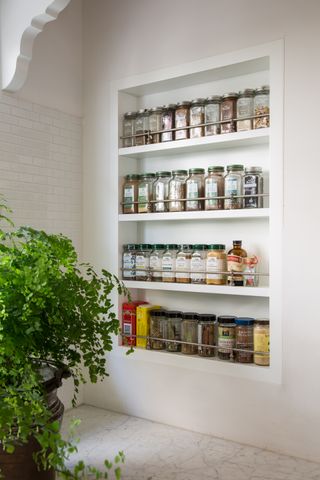 mini alcove with spice rack, marble countertop