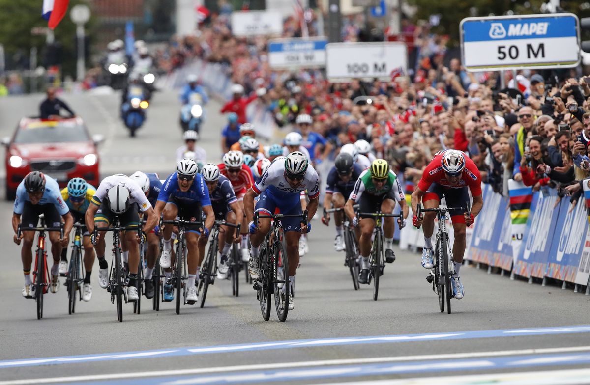 Peter Sagan (Slovakia) out-sprints Alexander Kristoff (Norway) to win his third straight world title