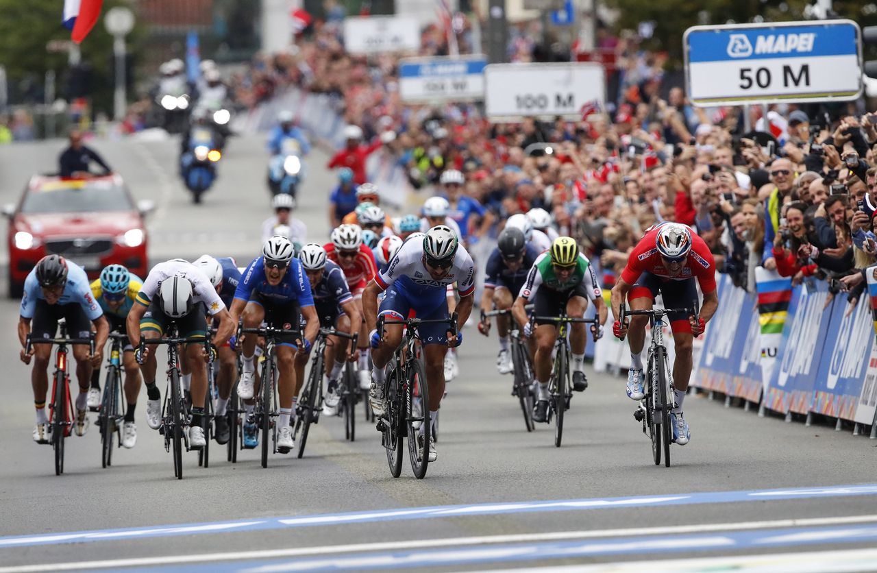 Peter Sagan (Slovakia) out-sprints Alexander Kristoff (Norway) to win his third straight world title