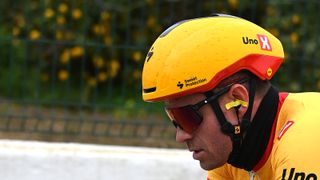A close up of Alexander Kristoff wearing a modified TT helmet