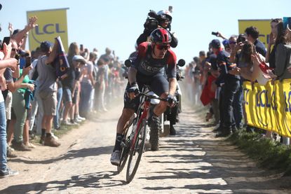 Dylan Van Baarle (Ineos Grenadiers) races through Mons-en-P&eacute;v&egrave;le cobbled sector during Paris-Roubaix 2022
