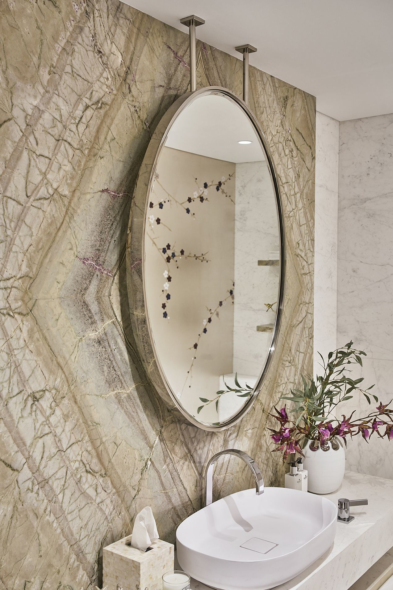 Powder room with round mirror