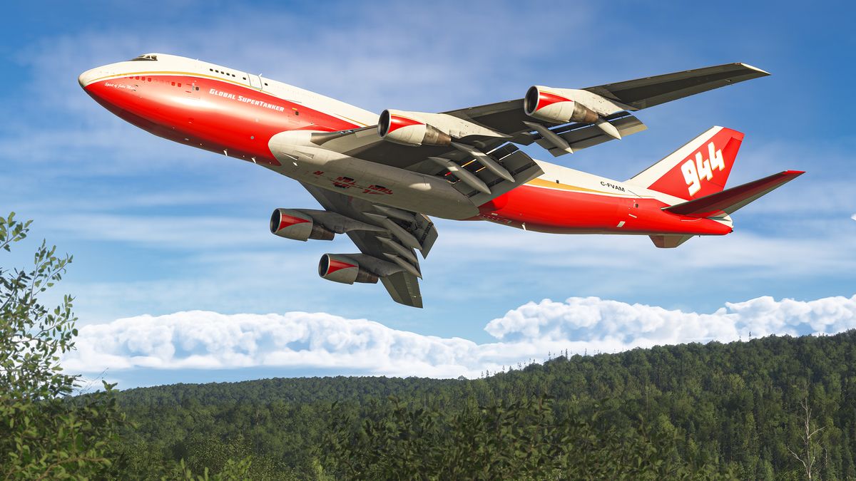 A passenger jet flying over a forest