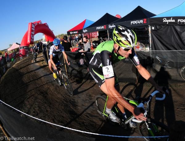 Ryan Trebon (Cannondale-Cyclocrossworld.com) nearing the flyover with Summerhill close behind