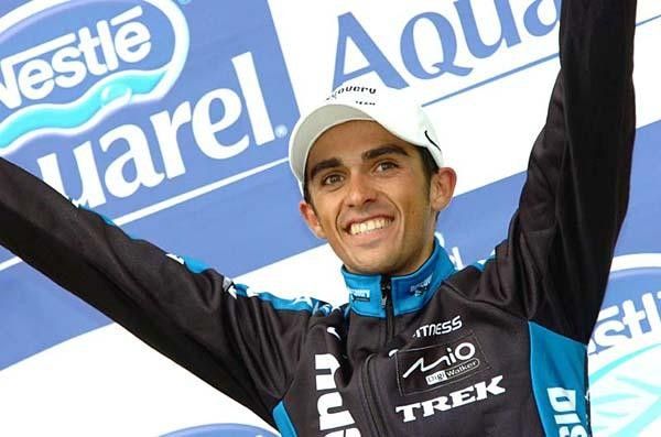Contador on the podium and rightfully smiling.