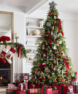 traditional red green christmas tree and mantel decor