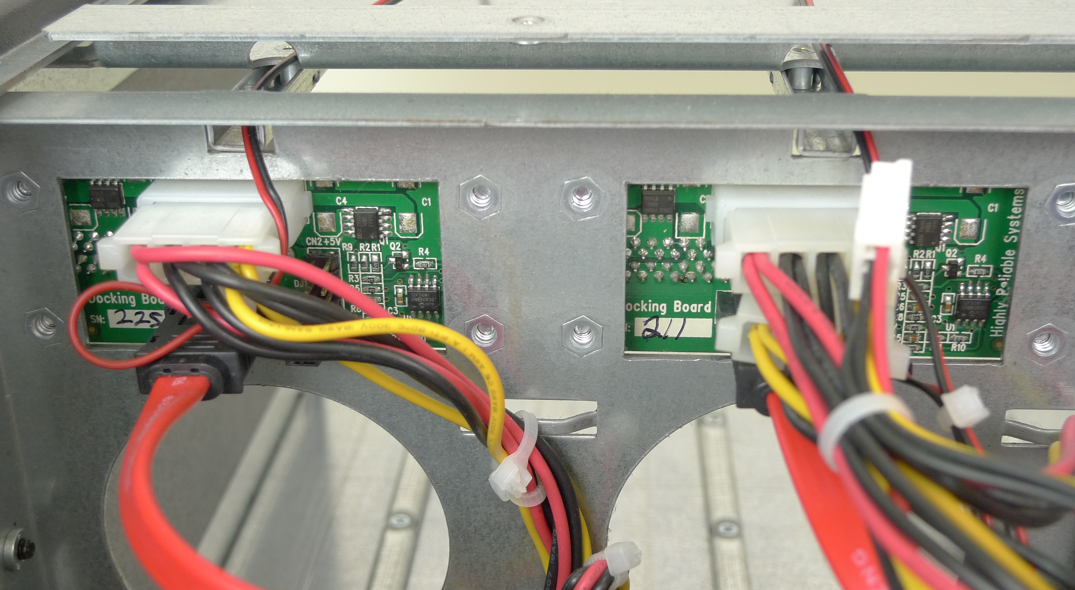 Molex and SATA connections plugged into the RAIDPac docking boards from within the rear compartment of the RAIDFrame. Though the connections are in place, we had one molex connector that was loosened during shipping.