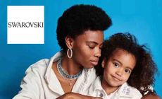 Swarovski Logo placed over a mother and daughter 