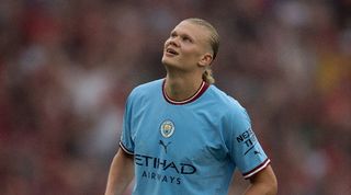 Erling Haaland in action for Manchester City against Liverpool.