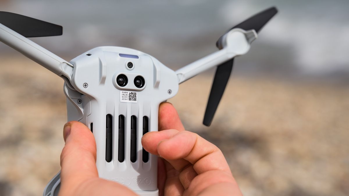 Closeup of the Potensic Atom 3 beginner drone's downward facing sensors