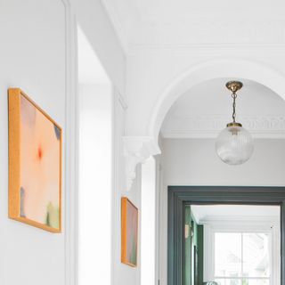 a close up of some original Victorian corbels in a hallway