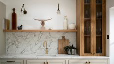 chic modern kitchen with marble splashback and wooden cabinet and open shelving