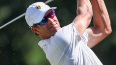 Adam Scott takes a shot at the 2022 Presidents Cup at Quail Hollow