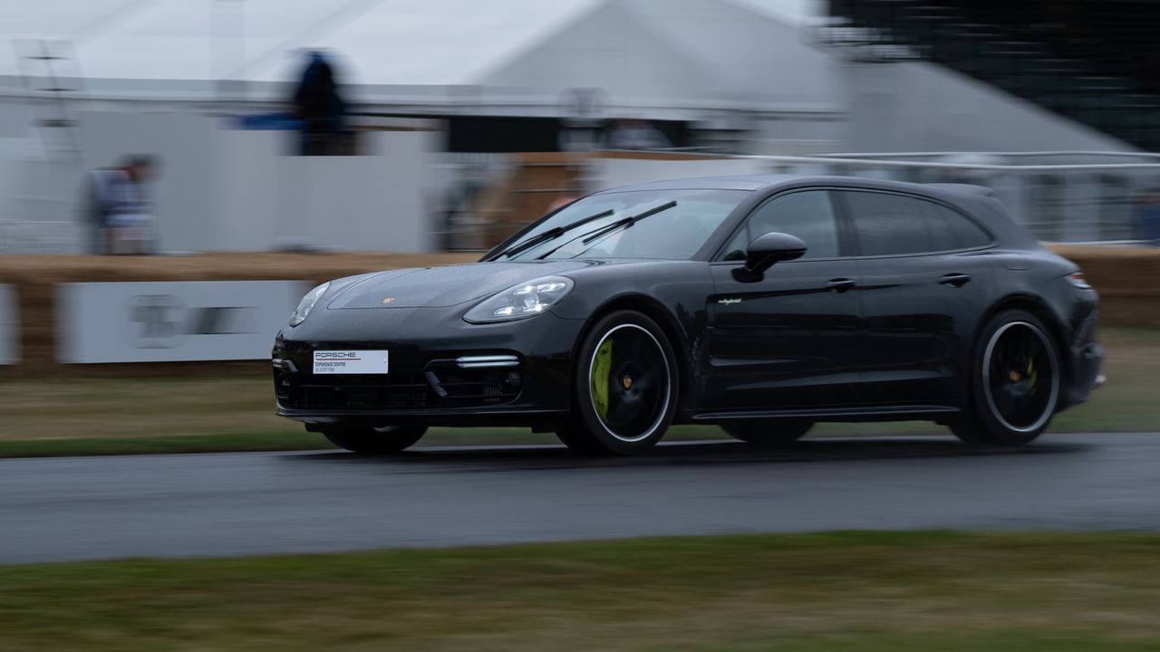 A car racing on as track at Goodwood