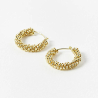 Dapple Twisted Bead Gold Plated Hoop Earrings: was £55now £26 at Oliver Bonas (save £29)