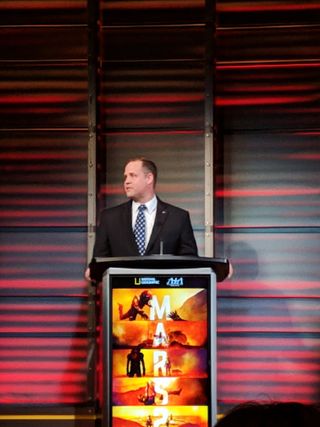 NASA Administrator Jim Bridenstine addresses a crowd at National Geographic headquarters about humanity's bright future on the moon and Mars.