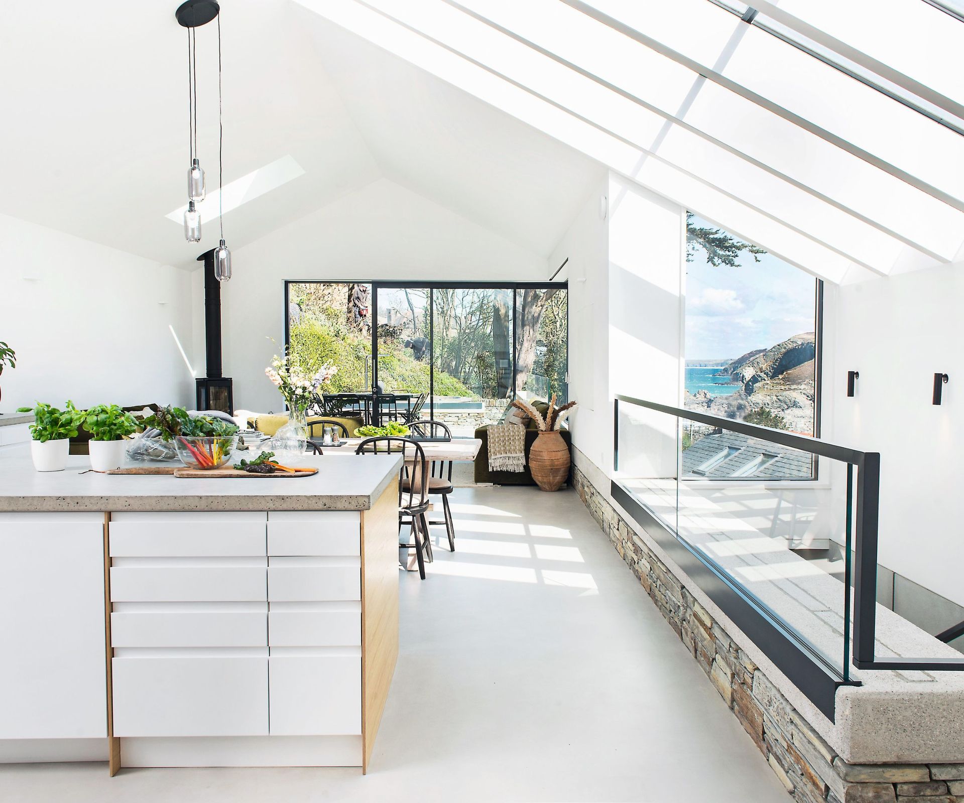 White drawers, black railings, white floor