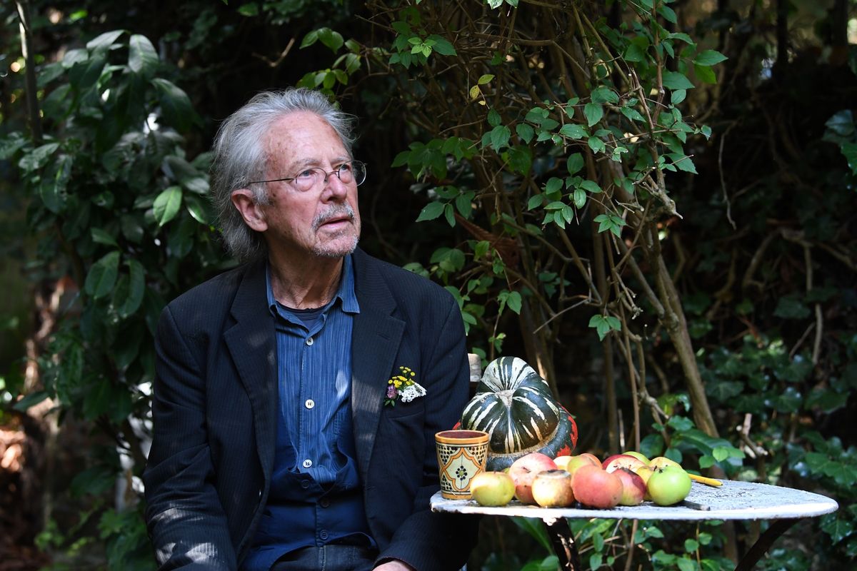 Austrian writer Peter Handke poses in Chaville, in the suburbs of Paris, on Oct. 10, 2019 after he was awarded the 2019 Nobel Prize in literature.