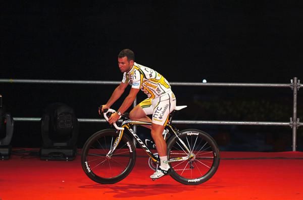 Mark Cavendish rides onto the stage for the team presentation