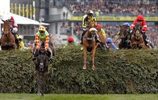 who will win the Grand National Paddy Brennan and Saint Are (second left) lead over the first fence at the 2016 Crabbie&rsquo;s Grand National