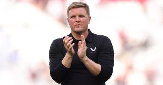 Newcastle United manager Eddie Howe applauds during the Premier League match between West Ham United and Newcastle United at London Stadium on October 8, 2023 in London, England.
