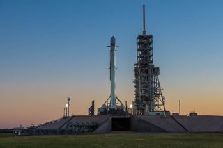 A SpaceX Falcon 9 rocket carrying the Koreasat-5A communications Satellite stands atop Pad 39A at NASA's Kennedy Space Center in Cape Canaveral, Florida ahead of an Oct. 30, 2017 launch.