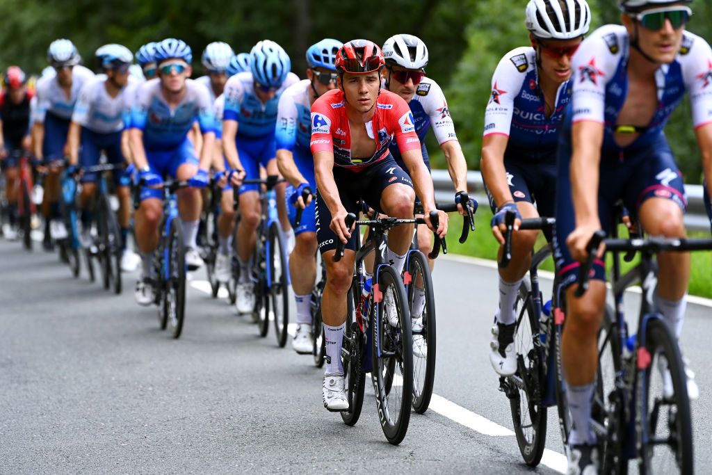 CISTIERNA SPAIN AUGUST 26 Remco Evenepoel of Belgium and Team QuickStep Alpha Vinyl Red Leader Jersey competes during the 77th Tour of Spain 2022 Stage 7 a 190km stage from Camargo to Cistierna LaVuelta22 WorldTour on August 26 2022 in Cistierna Spain Photo by Tim de WaeleGetty Images